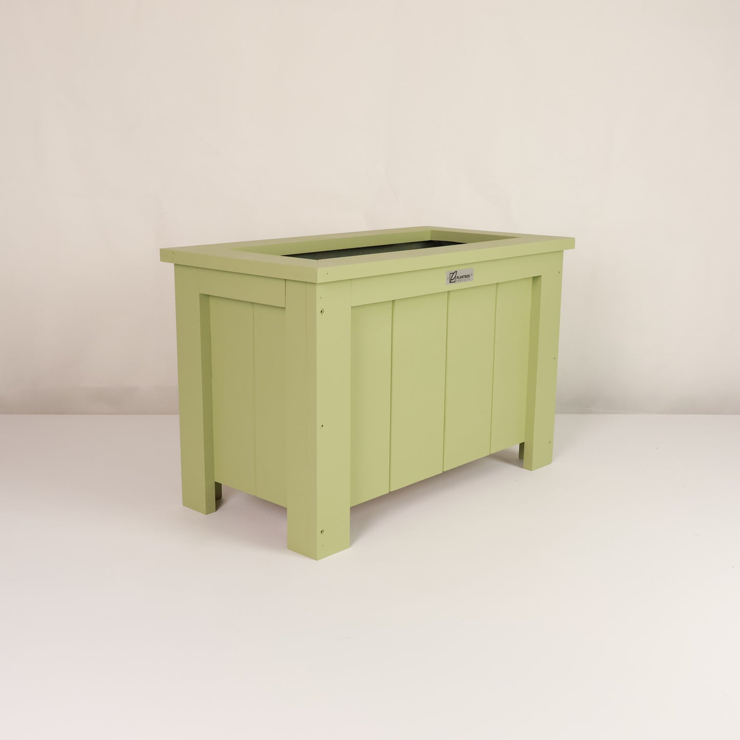 Macrocarpa timber. Modern, large, green coloured outdoor planter box, chemical free.