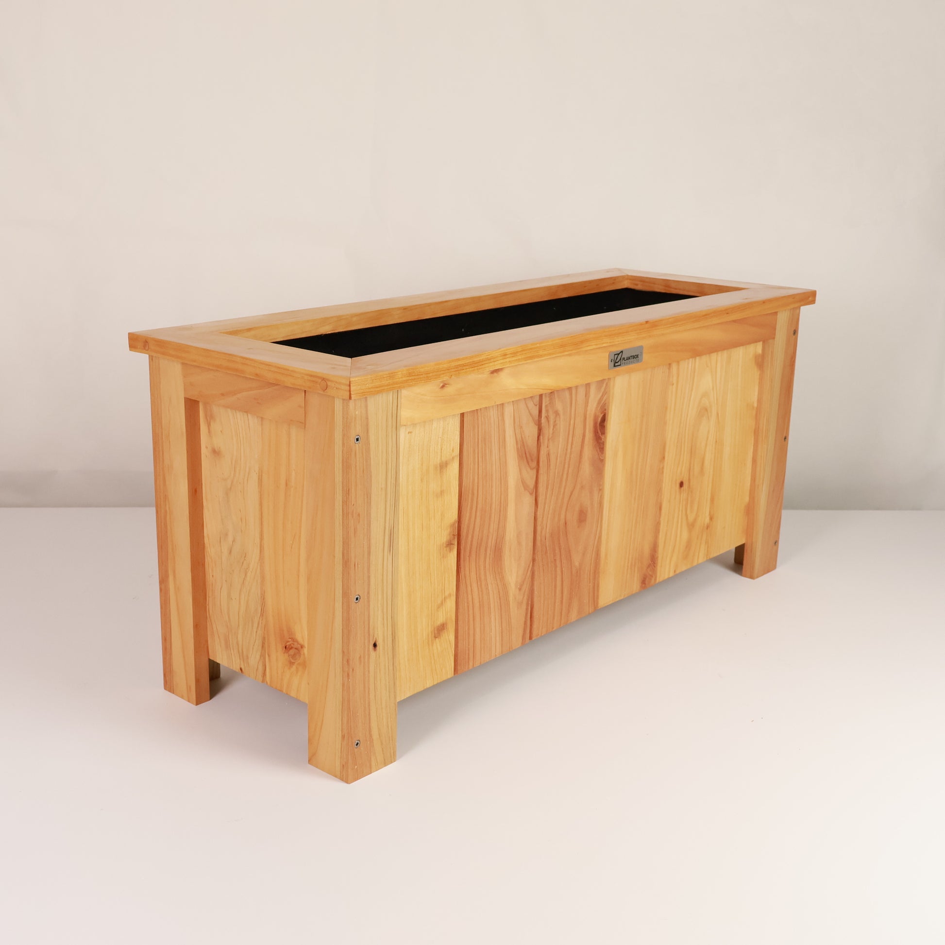 Modern, large, natural finish, outdoor planter box, chemical free, made of macrocarpa timber. 