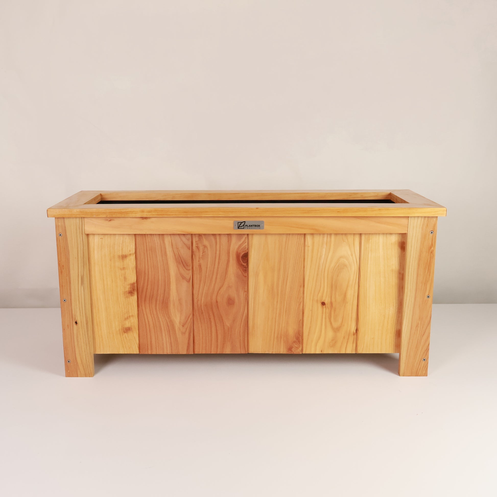 Modern, large, natural finish, outdoor planter box, chemical free, made of macrocarpa timber. 