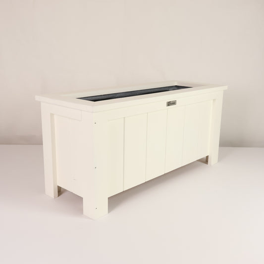 Modern, large, white coloured outdoor planter box, chemical free, made of macrocarpa timber. 