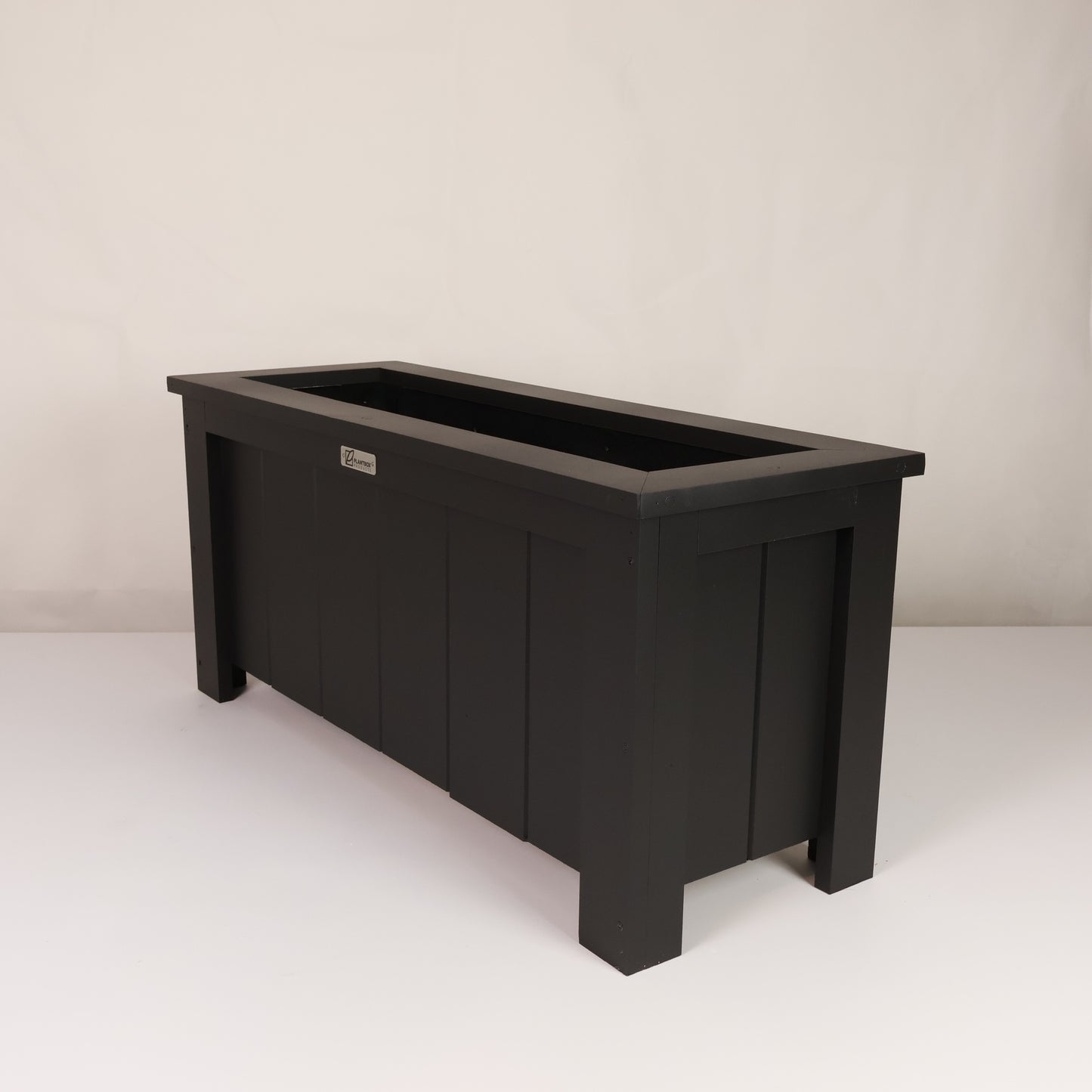 Modern, large, black finish, outdoor planter box, chemical free, made of macrocarpa timber. 