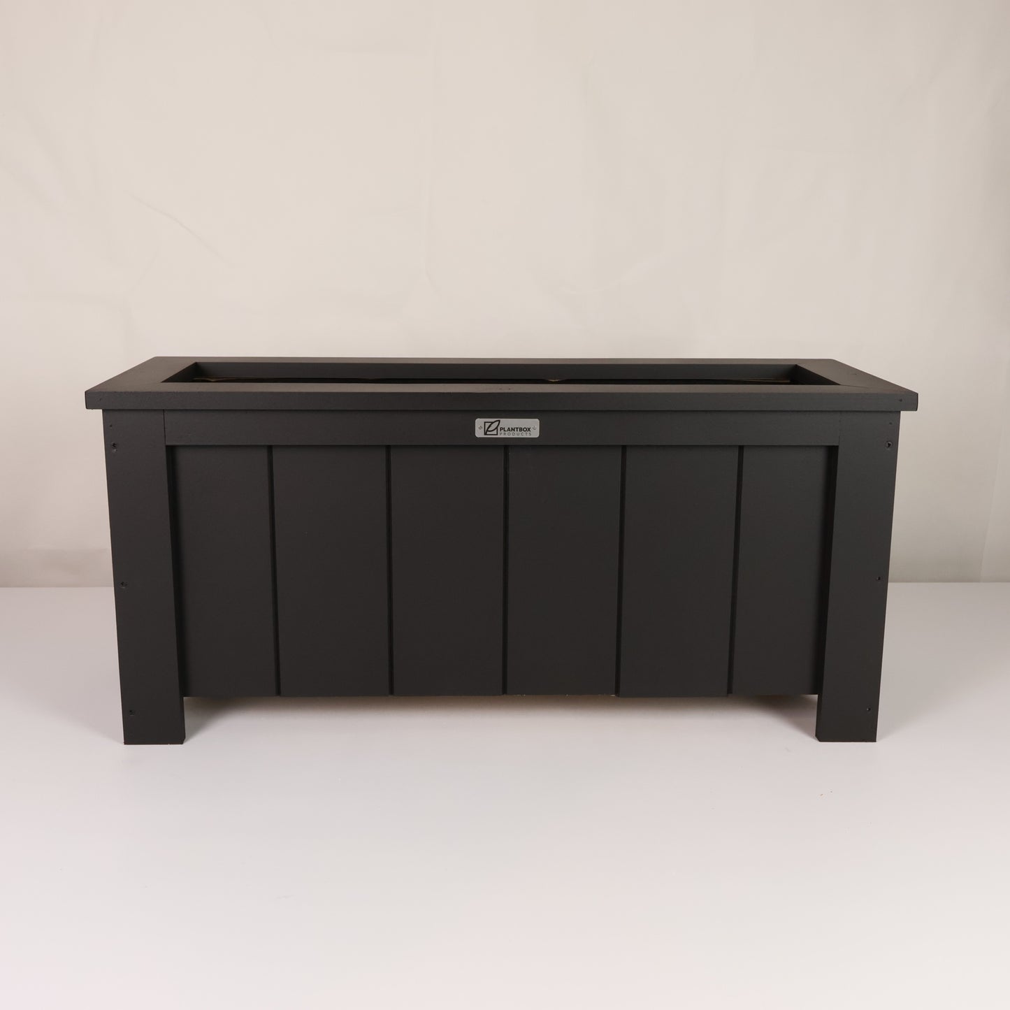 Modern, large, black finish, outdoor planter box, chemical free, made of macrocarpa timber. 