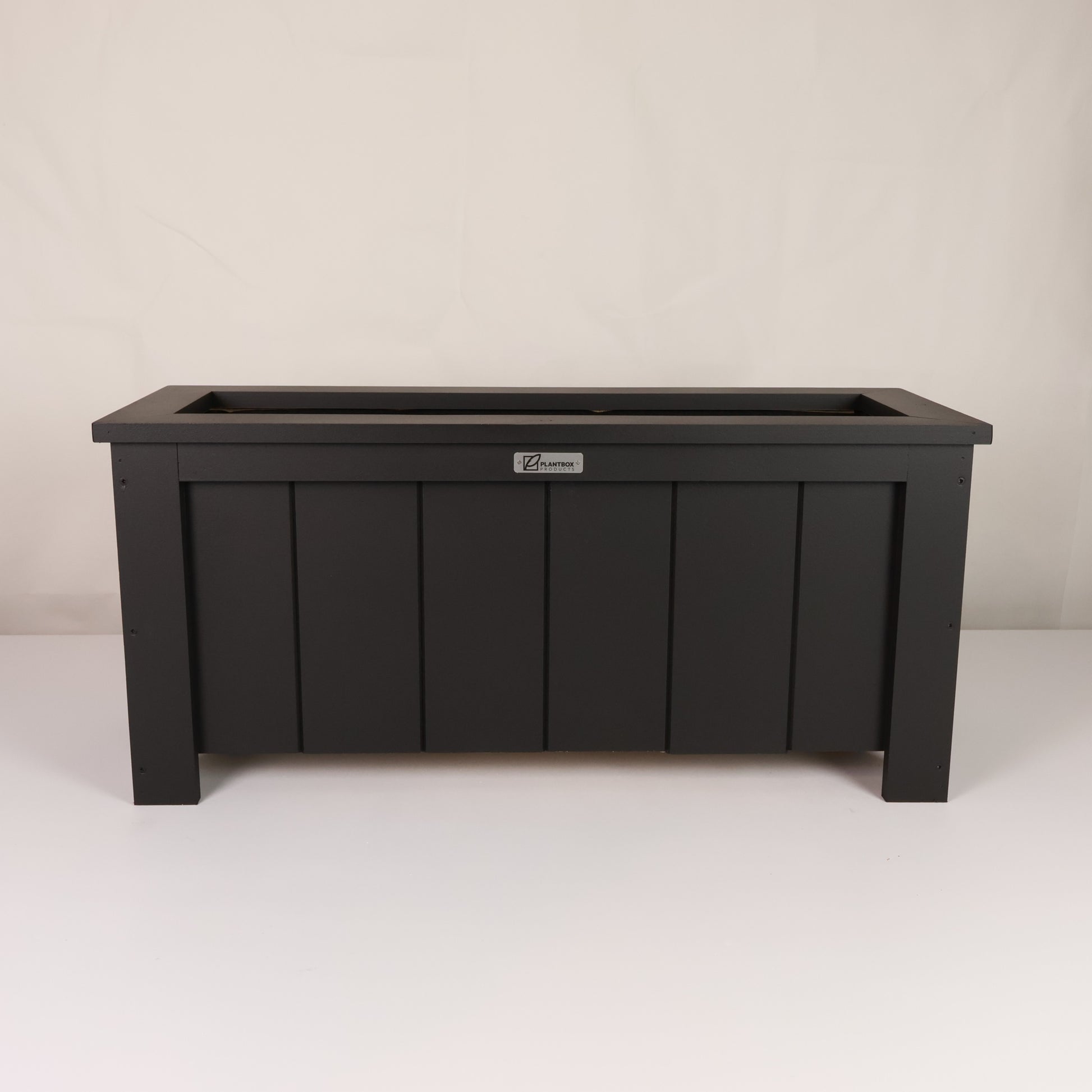 Modern, large, black finish, outdoor planter box, chemical free, made of macrocarpa timber. 