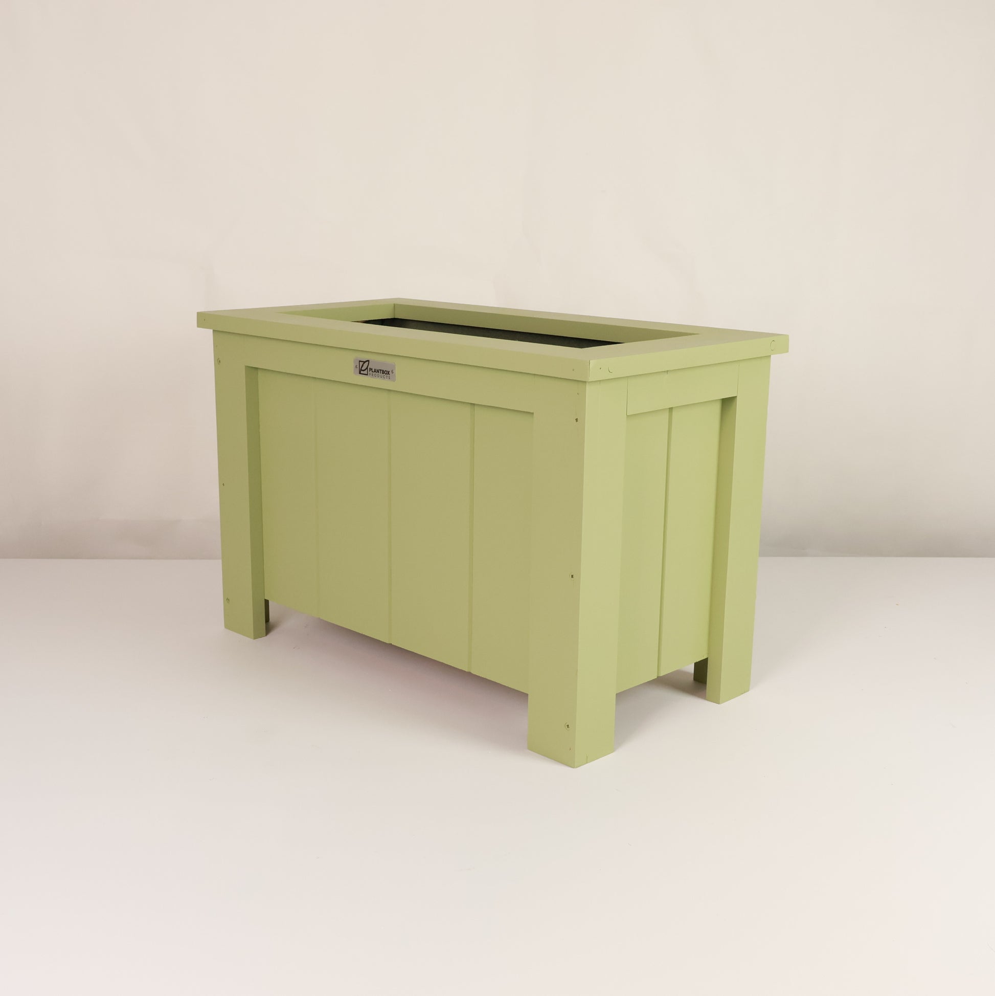 Macrocarpa timber. Modern, large, green coloured outdoor planter box, chemical free. 