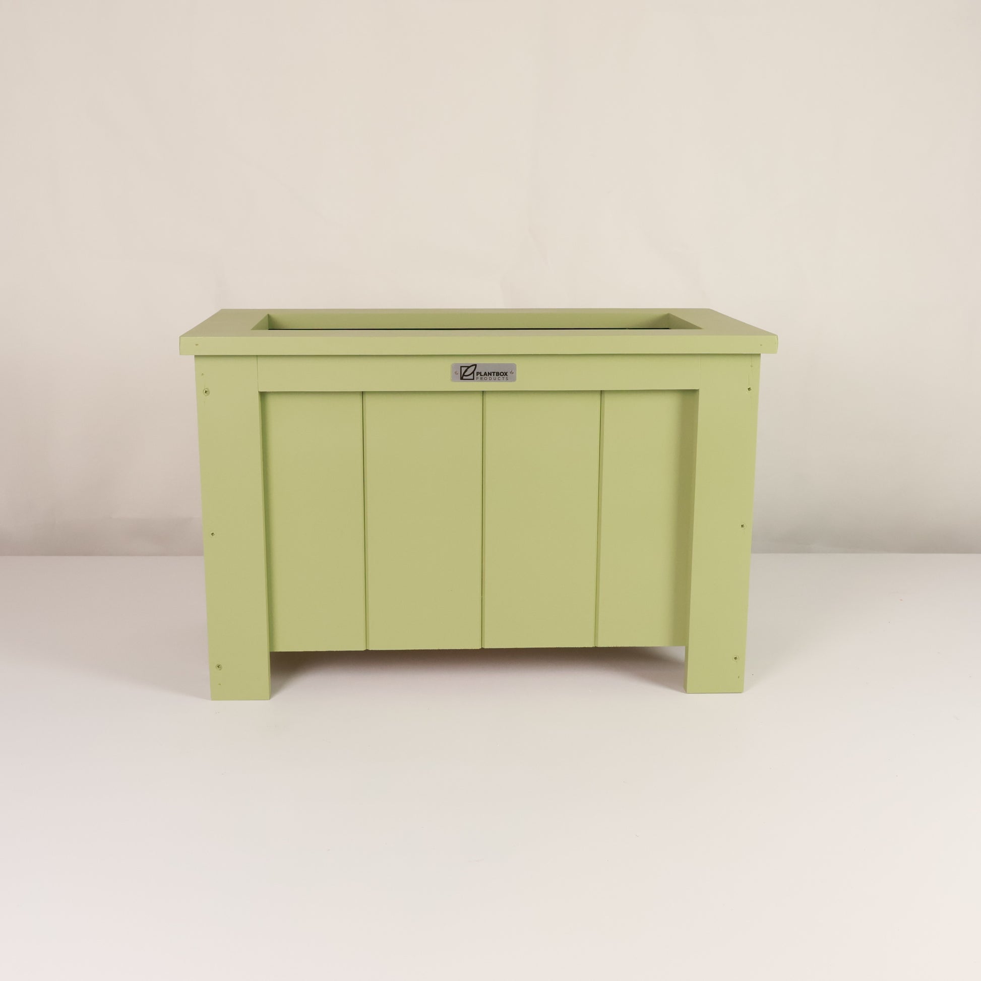 Macrocarpa timber. Modern, large, green coloured outdoor planter box, chemical free. 