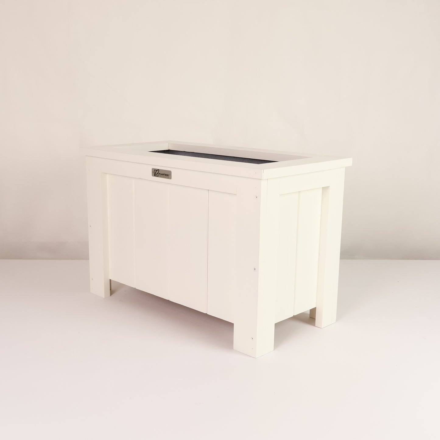 Macrocarpa timber. Modern, large, white coloured outdoor planter box, chemical free. 