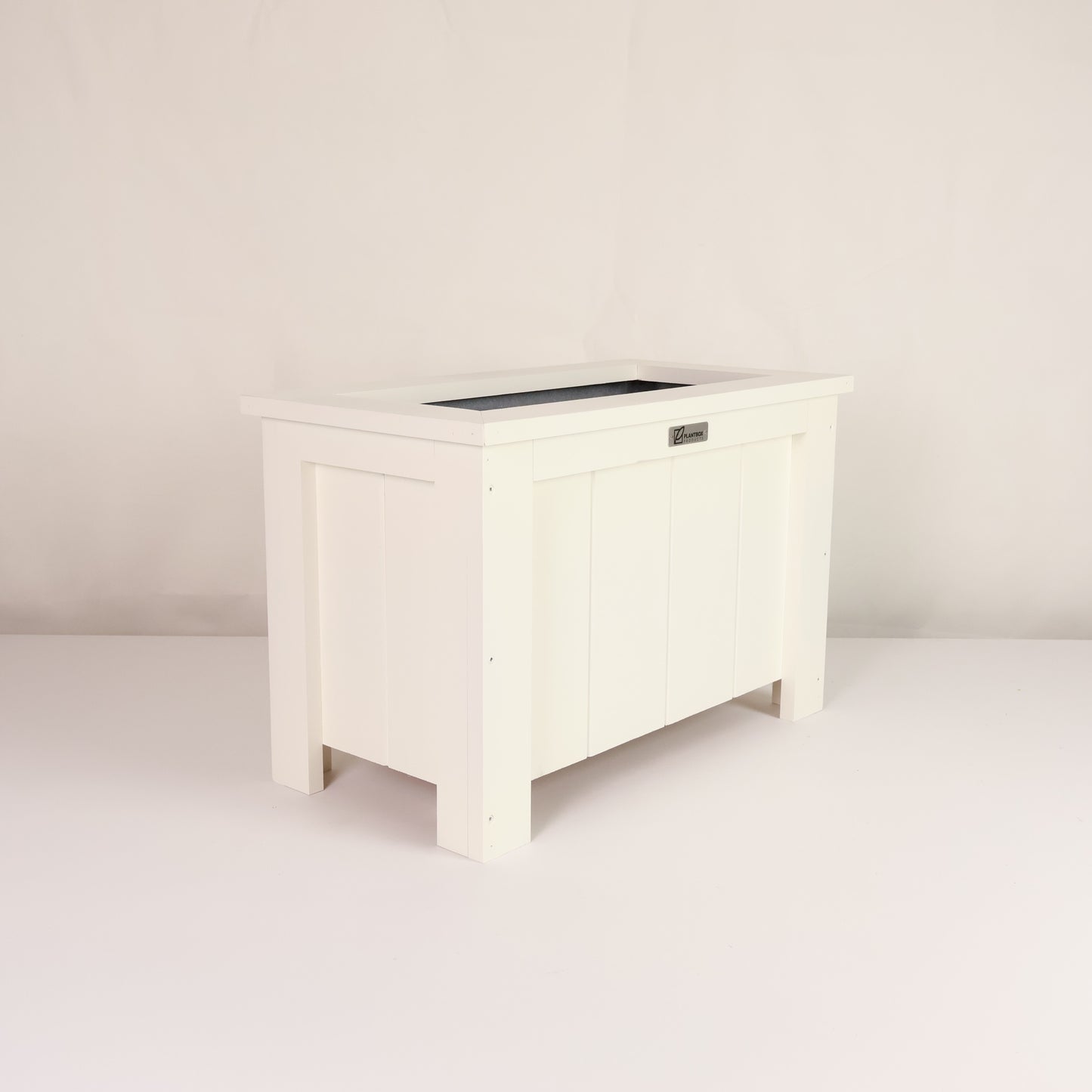 Macrocarpa timber. Modern, large, white coloured outdoor planter box, chemical free. 