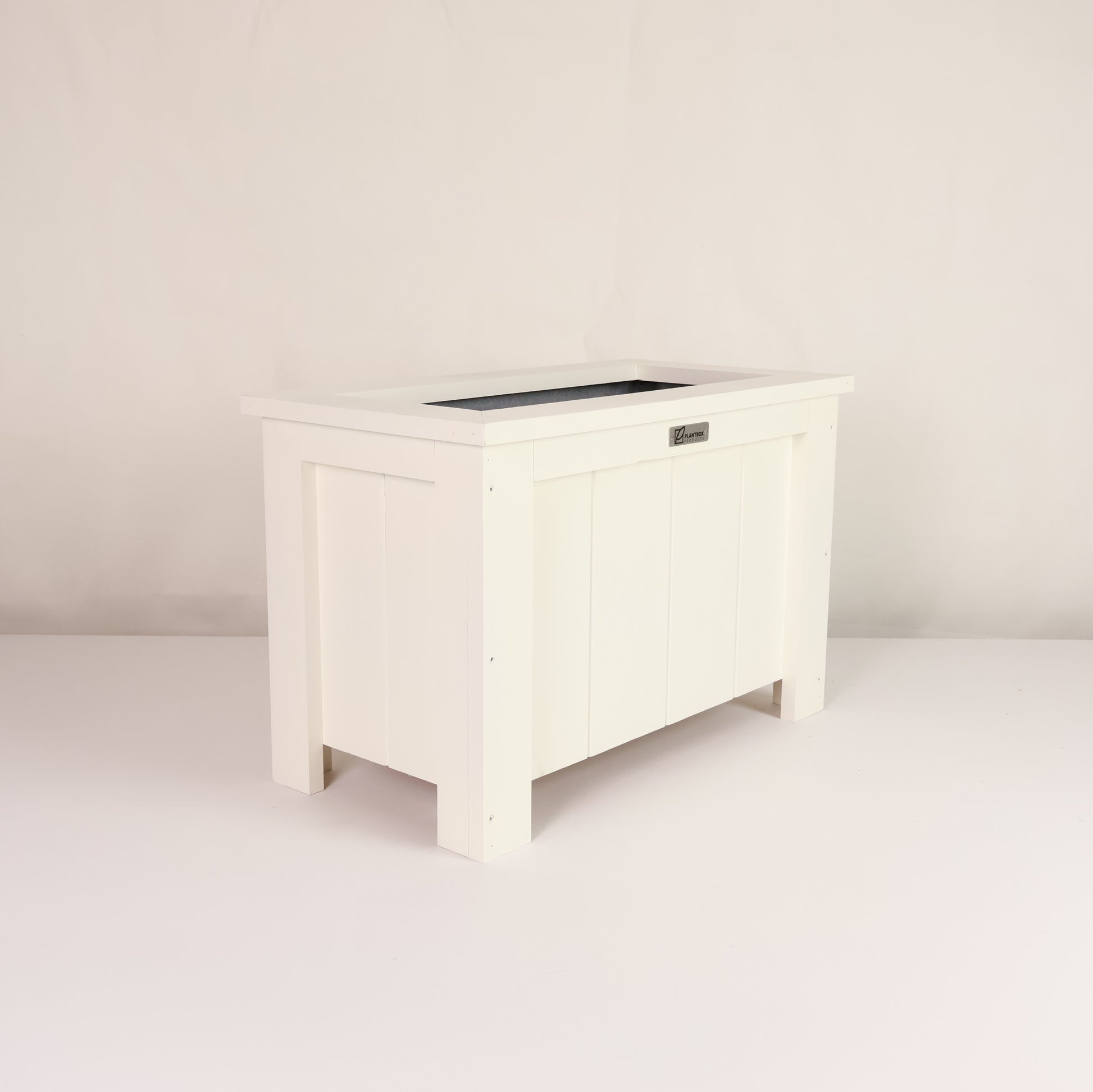 Macrocarpa timber. Modern, large, white coloured outdoor planter box, chemical free. 