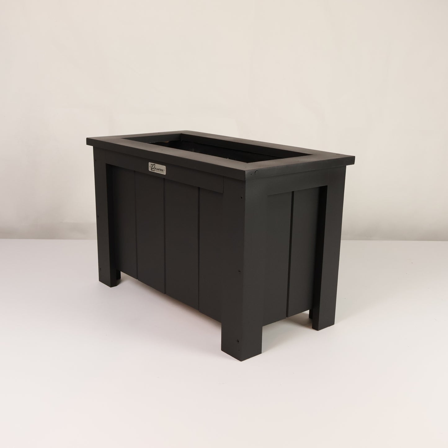 Macrocarpa timber. Modern, large, black coloured outdoor planter box, chemical free. 