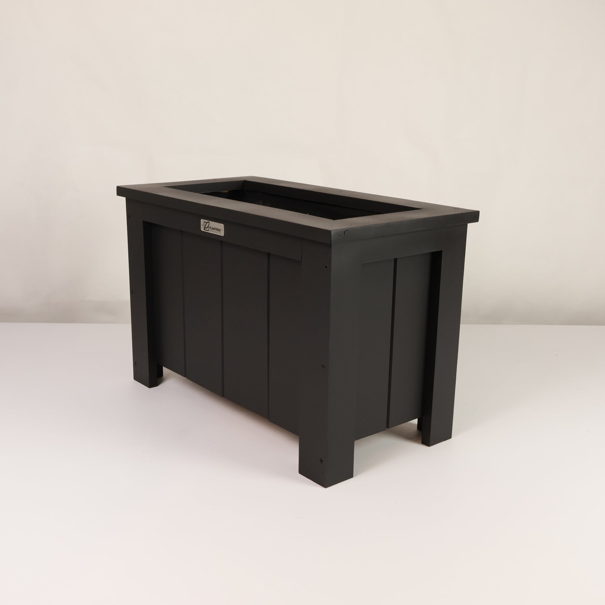 Macrocarpa timber. Modern, large, black coloured outdoor planter box, chemical free. 