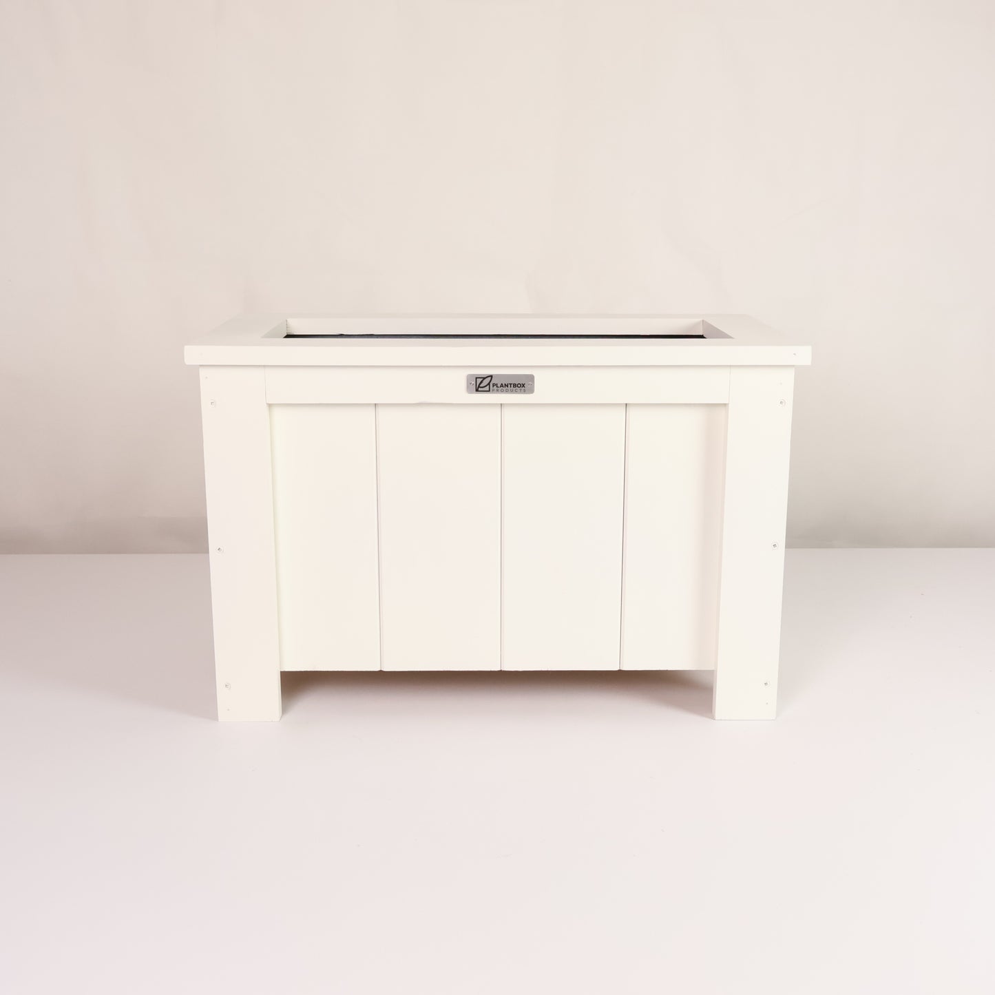 Macrocarpa timber. Modern, large, white coloured outdoor planter box, chemical free. 