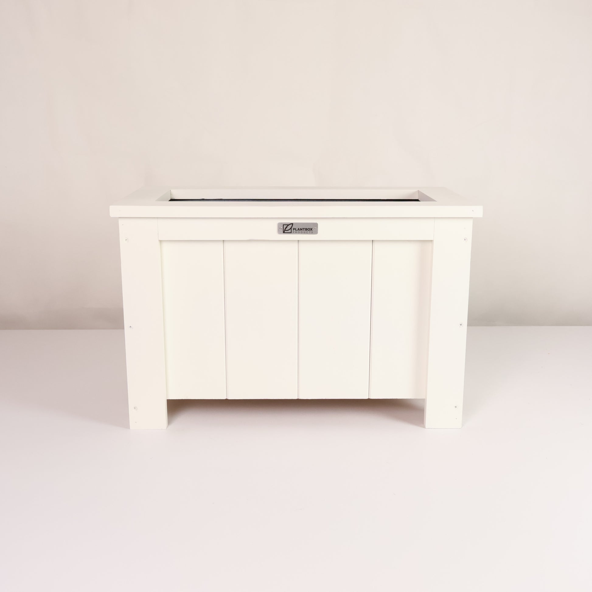 Macrocarpa timber. Modern, large, white coloured outdoor planter box, chemical free. 
